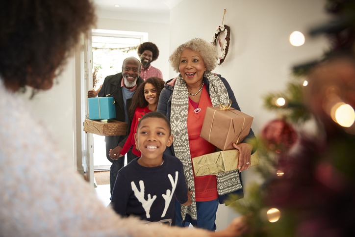 Image of a family carry gift