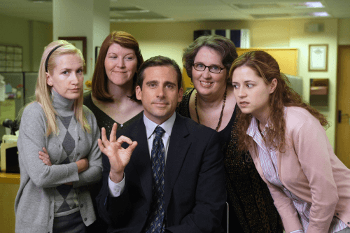 This is an image of Michael Scott with other 4 other females from The Office TV Show